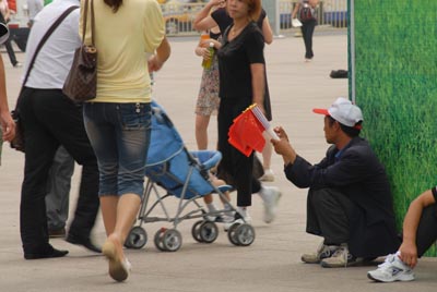 Flaggenverkäufer auf dem Tian'anmen